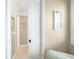 Hallway with neutral paint and white trim provides access to other rooms at 6700 Gulf Dr # B8, Holmes Beach, FL 34217
