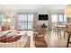 Inviting living area with ocean views, wicker furniture, and stylish décor at 6700 Gulf Dr # B8, Holmes Beach, FL 34217