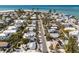 Beautiful aerial view of a charming coastal community with a beach nearby at 701 N Bay Blvd, Anna Maria, FL 34216
