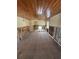 Unfinished living room featuring original wood ceiling and floors at 701 N Bay Blvd, Anna Maria, FL 34216