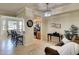 Open living space with breakfast bar and modern kitchen at 8403 Grand Estuary Trl # 103, Bradenton, FL 34212
