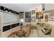 Finished basement with projector screen, large sofa and decor at 10002 Cherry Hills Avenue Cir, Bradenton, FL 34202