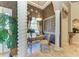 Stylish office space with decorative columns, elegant desk, and plenty of natural light at 10002 Cherry Hills Avenue Cir, Bradenton, FL 34202