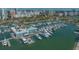 Aerial shot of a waterfront with docked yachts and buildings, creating a vibrant city and harbor scene at 101 S Gulfstream Ave # 4J, Sarasota, FL 34236