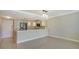 Open floor plan with a combined kitchen featuring stainless steel appliances and plenty of cabinet space at 101 S Gulfstream Ave # 4J, Sarasota, FL 34236