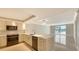 Modern kitchen with granite countertops, stainless steel appliances, and an open layout to dining and living area at 101 S Gulfstream Ave # 4J, Sarasota, FL 34236