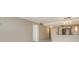 Bright living space featuring neutral walls adjacent to an open kitchen area, enhancing the home's modern appeal at 101 S Gulfstream Ave # 4J, Sarasota, FL 34236