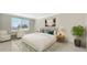Well-appointed main bedroom with a king bed, stylish decor, and large windows with natural light at 101 S Gulfstream Ave # 4J, Sarasota, FL 34236