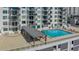 Rooftop pool and lounge area of a high-rise building, for outdoor relaxation at 101 S Gulfstream Ave # 4J, Sarasota, FL 34236
