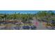 Scenic street view with American flag, landscaping, and waterfront in the distance at 101 S Gulfstream Ave # 4J, Sarasota, FL 34236