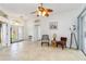 Living room with tile flooring, stylish furniture, and natural light at 10306 Palmbrooke Ter, Bradenton, FL 34202
