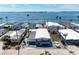 Stunning aerial view of waterfront community showcasing the home's prime location near the water at 10315 Cortez W Rd # 17F, Bradenton, FL 34210