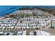 Overhead view of a dense residential community with uniform homes and proximity to the waterfront at 10315 Cortez W Rd # 17F, Bradenton, FL 34210