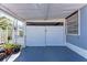 Attached carport providing covered parking and easy access to the house with storage at 10315 Cortez W Rd # 17F, Bradenton, FL 34210