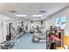 Well-equipped gym with modern machines and weights for residents to maintain an active lifestyle at 10315 Cortez W Rd # 17F, Bradenton, FL 34210