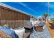 Relaxing outdoor patio featuring stylish wicker furniture and a bamboo privacy screen at 10315 Cortez W Rd # 17F, Bradenton, FL 34210