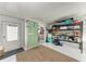 Spacious storage area with an outside shower, shelving, and convenient laundry access at 10315 Cortez W Rd # 17F, Bradenton, FL 34210