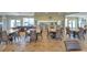 Bright clubhouse features kitchen, tables, and chairs for community gatherings and social events at 1141 W Peppertree Dr # 1141, Sarasota, FL 34242