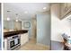 Open-concept kitchen with breakfast bar offering ample counter space at 1141 W Peppertree Dr # 1141, Sarasota, FL 34242