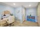 Cozy home office with ample natural light, built-in storage, and charming coastal-themed decor at 1141 W Peppertree Dr # 1141, Sarasota, FL 34242