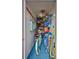 Well-organized storage area filled with beach gear and a bicycle at 1141 W Peppertree Dr # 1141, Sarasota, FL 34242