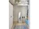 Walk-in closet with shelves and hanging space for optimal organization at 1141 W Peppertree Dr # 1141, Sarasota, FL 34242