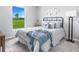 Serene bedroom with a large window and a comfortable bed, perfect for relaxation and rest at 12042 Crossgate Ave, Port Charlotte, FL 33981
