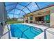 Enjoy this screened-in pool with a covered patio, perfect for outdoor entertaining and relaxation at 12809 Rainwashed Loop, Parrish, FL 34219