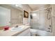 The bathroom features a shower and tub combination and a vanity with sink at 1310 Grand Blvd # 202, Sarasota, FL 34232