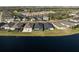 Aerial view of homes located on the water with screened in back porches and plenty of privacy from neighbors at 14238 59Th E Cir, Bradenton, FL 34211