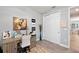 Versatile bedroom doubling as an office space, featuring modern decor, closet, and natural light for a productive atmosphere at 14238 59Th E Cir, Bradenton, FL 34211