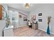 Comfortable bedroom designed as a workspace, featuring desk, natural light, and decor that inspires creativity at 14238 59Th E Cir, Bradenton, FL 34211