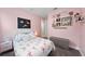 Pink bedroom with flamingo accents and cozy decor at 14238 59Th E Cir, Bradenton, FL 34211