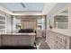 Bright main bedroom featuring light wood furnishings and soft, neutral decor at 14238 59Th E Cir, Bradenton, FL 34211