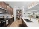 Well-organized pantry with multiple shelves, providing ample storage space at 14238 59Th E Cir, Bradenton, FL 34211