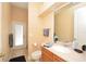 Bathroom features a single vanity, toilet and shower - perfect for guests or a smaller Gathering member at 15484 Alsask Cir, Port Charlotte, FL 33981