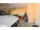 Spacious garage with ample room for parking and storage, including bikes and sports equipment at 15484 Alsask Cir, Port Charlotte, FL 33981