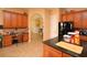 The kitchen is a chef's dream, boasting ample counter space, storage, and seamless access to dining spaces at 15484 Alsask Cir, Port Charlotte, FL 33981