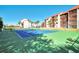 Community tennis court with well-maintained surface, perfect for active recreation and waterfront views at 1618 Stickney Point Rd # 101, Sarasota, FL 34231