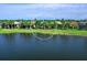 Water view of the lawn and landscape of the home from the backyard at 17019 Hampton Falls Ter, Lakewood Ranch, FL 34202