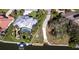 Stunning home with boat dock, lift, pool, and lush landscaping at 1838 Sandalwood Dr, Sarasota, FL 34231