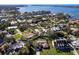 Stunning aerial view of a waterfront community with lush landscaping and beautiful homes at 1838 Sandalwood Dr, Sarasota, FL 34231