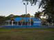 Community aquatic park with playground and colorful splash pad at 1838 Sandalwood Dr, Sarasota, FL 34231