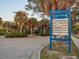 Potter Park sign listing amenities such as tennis courts, trails, a gazebo, playground, and picnic area at 1838 Sandalwood Dr, Sarasota, FL 34231