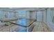 Community game room with a ping pong table and a pool table at 2301 Gulf Of Mexico Dr # 33N, Longboat Key, FL 34228