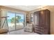 Cozy living room featuring a large window with ocean views and a telescope for stargazing at 2301 Gulf Of Mexico Dr # 33N, Longboat Key, FL 34228