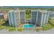 Aerial shot of the community's pool and condo buildings at 2301 Gulf Of Mexico Dr # 33N, Longboat Key, FL 34228