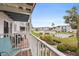 Balcony view overlooking courtyard, swimming pool and benches at 2326 Canal Dr # G25, Bradenton, FL 34207