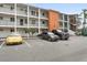 Multi-level condo building features ample parking spaces at 2326 Canal Dr # G25, Bradenton, FL 34207