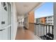 Hallway view of condo units with door mats and covered walkway at 2326 Canal Dr # G25, Bradenton, FL 34207